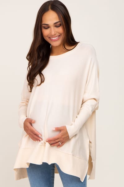 Rhea + Thea Ivory Dolman Sleeve Side Slit Maternity Sweater