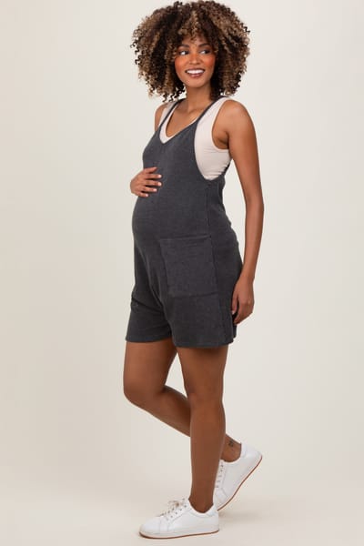 Rhea + Thea Black Solid Ribbed V-Neck Sleeveless Front Pocket Maternity Romper