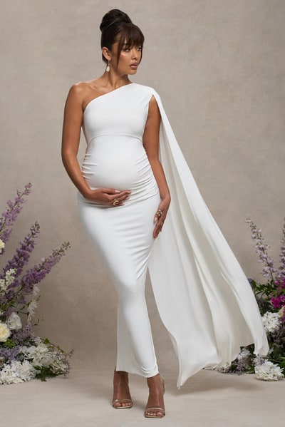 Club L London Amaryllis | White Maternity One Shoulder Maxi Dress with Cape Sleeve