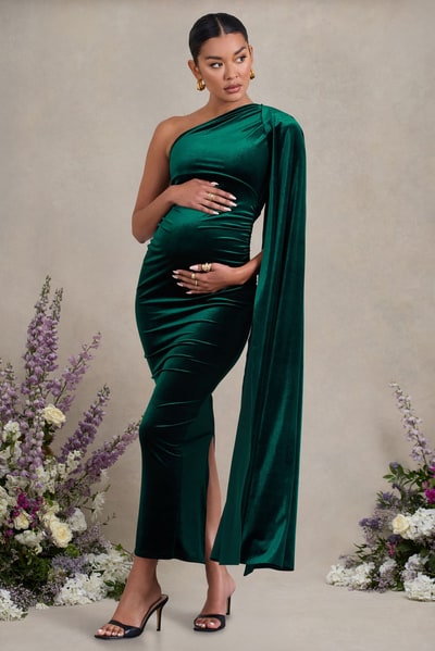 Club L London Amaryllis | Bottle Green Velvet Maternity One Shoulder Maxi Dress with Cape Sleeve