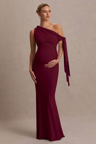 Club L London Orielle | Burgundy Asymmetric-Neck Maternity Maxi Dress With Knot-Sleeve And Sash